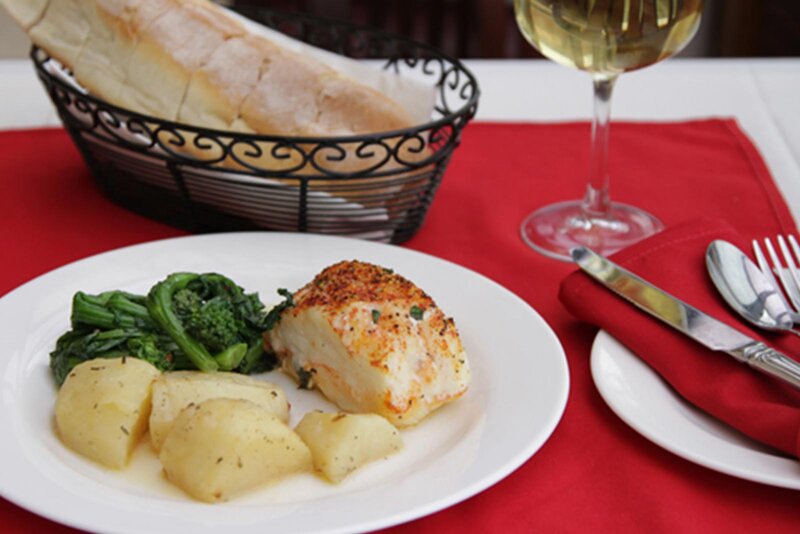 Salmon entree with potatoes and spinach